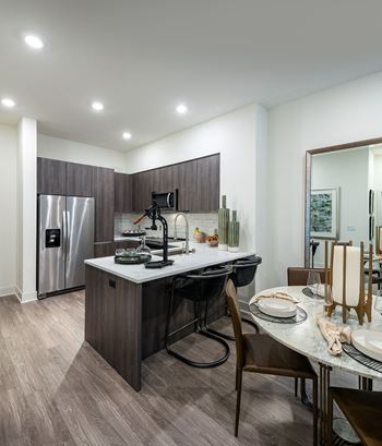 Gourmet Chef’s Kitchens with Stainless Steel Appliances Frameless Custom Soft - Close Cabinetry at Kinley West LA, Los Angeles, CA